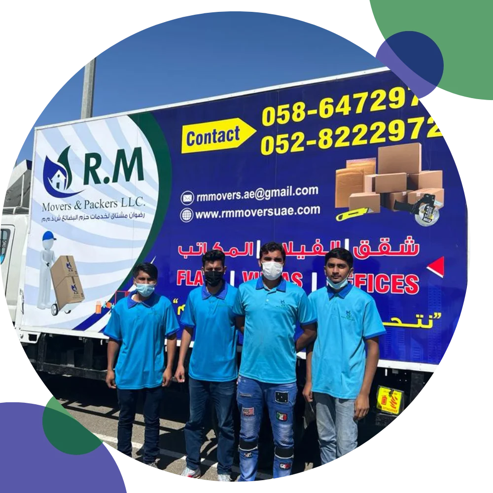 "Professional RMMovers team packing and securing boxes for safe transport"